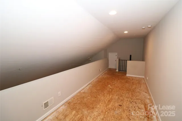 a view of a big room with an empty space