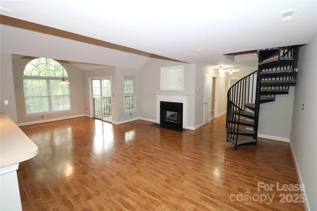 a view of livingroom with furniture and wooden floor