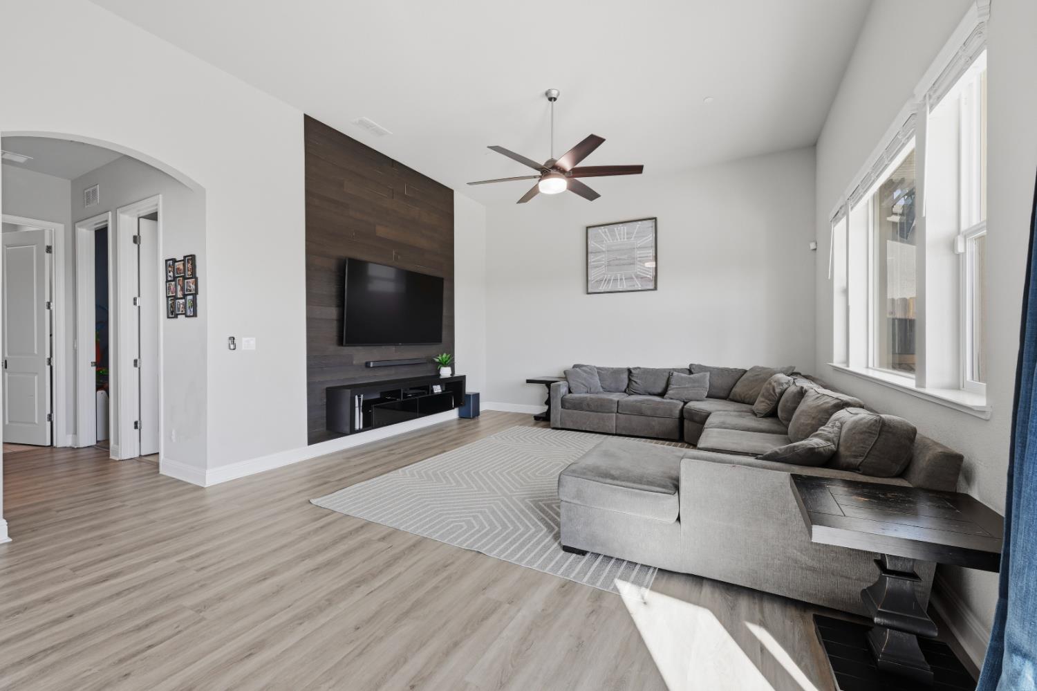 2012 Van Ruiten Drive Lodi, CA 95242 - Photo 16 of 49 a living room with furniture and a flat screen tv