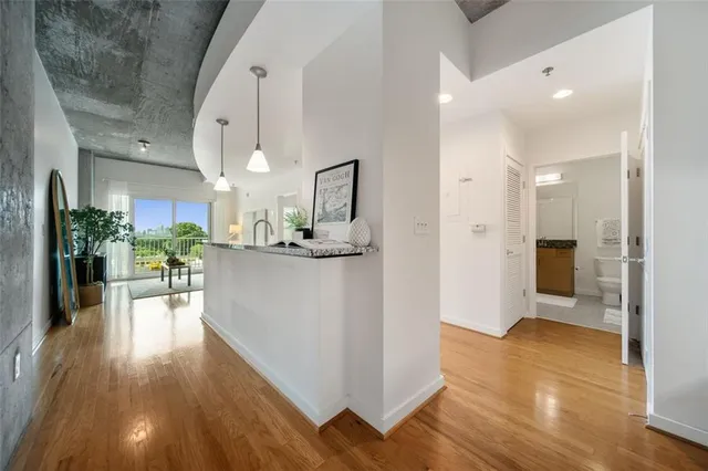 a view of a kitchen and dining room