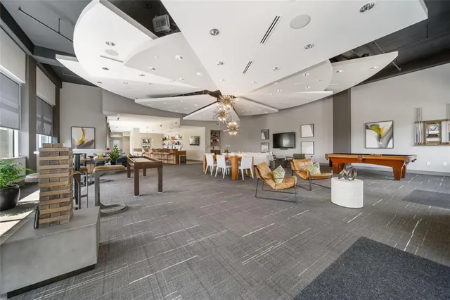 a room with gym equipment and a large window