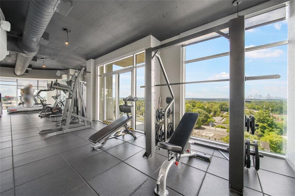 250 Pharr Road Northeast, Unit 412 Atlanta, GA 30305 - Photo 37 of 49 a view of a room with gym equipment