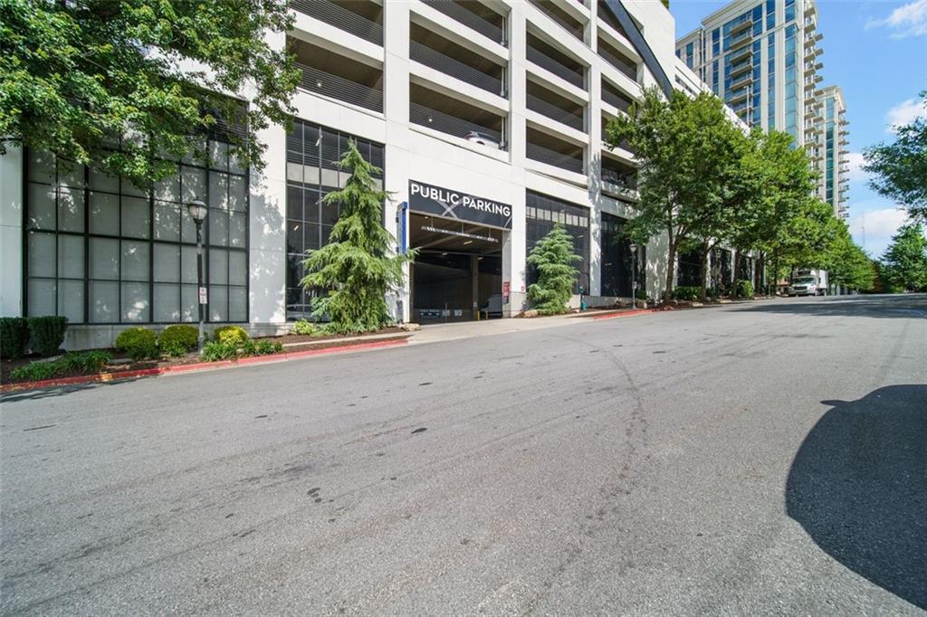 250 Pharr Road Northeast, Unit 412 Atlanta, GA 30305 - Photo 47 of 49 front view of a building with a street