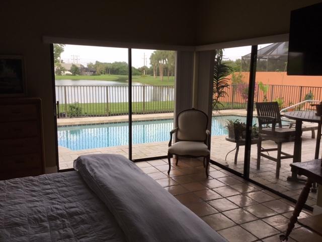 11079 Cloverleaf Circle Boca Raton, FL 33428 - Photo 19 of 44 Pool & Lake View from Master Suite