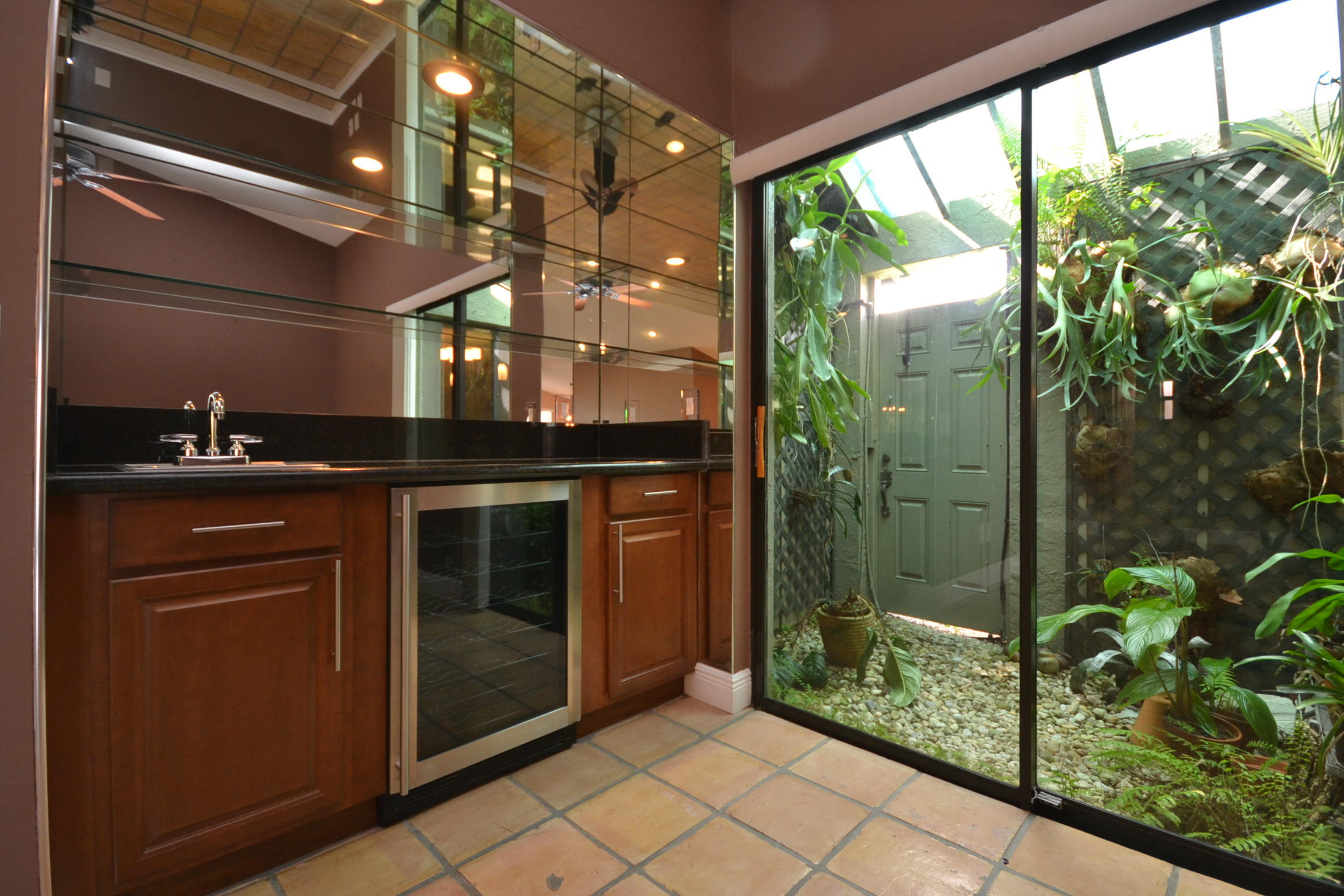 11079 Cloverleaf Circle Boca Raton, FL 33428 - Photo 9 of 44 Wet Bar and Courtyard