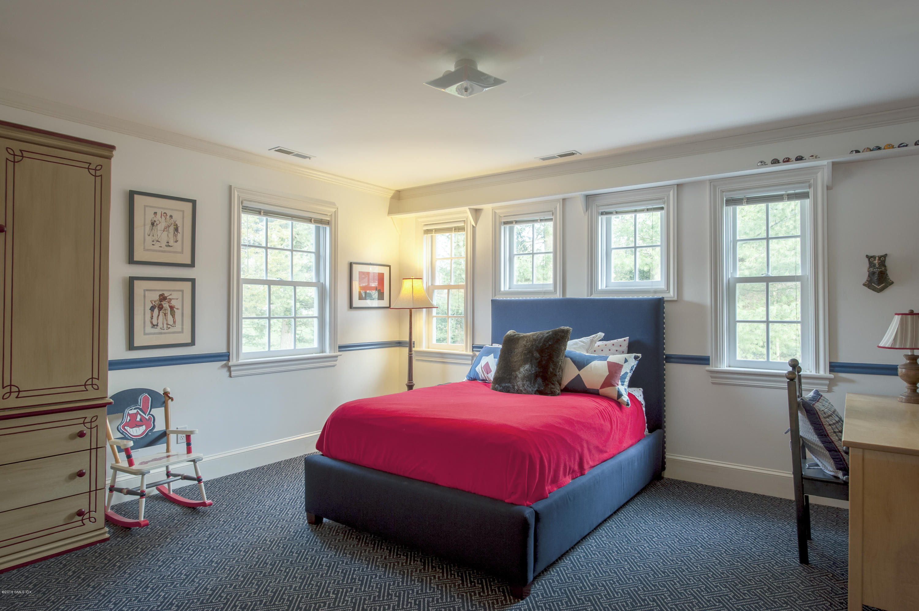 175 Stanwich Road Greenwich, CT 06830 - Photo 13 of 21 a bedroom with a bed and a window