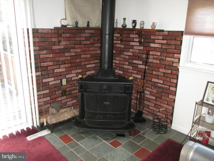 12107 Thornton Road Philadelphia, PA 19154 - Photo 11 of 25 Fireplace