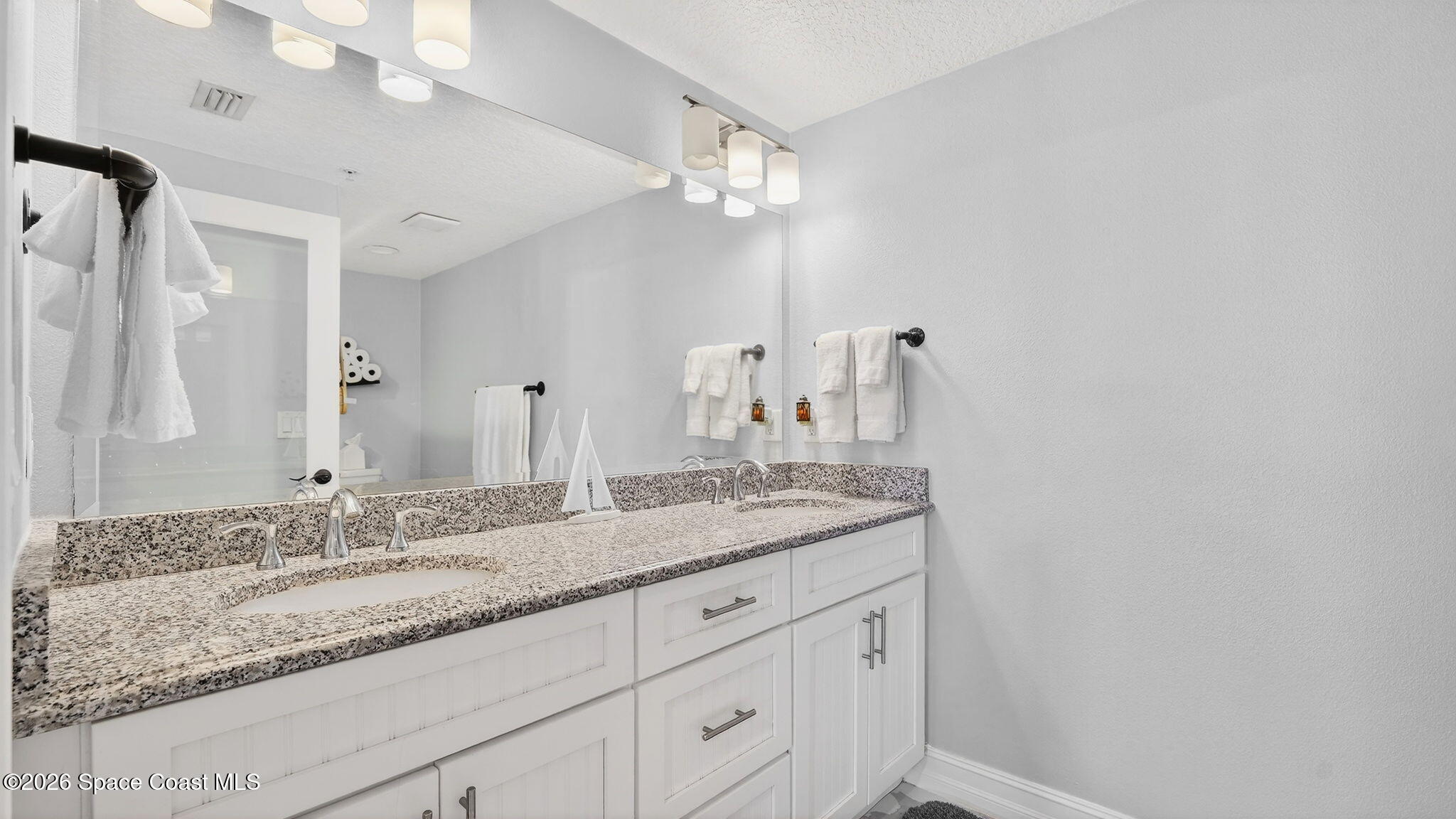 1805 Riverside Drive, Unit 302 Titusville, FL 32780 - Photo 28 of 49 Primary Bath