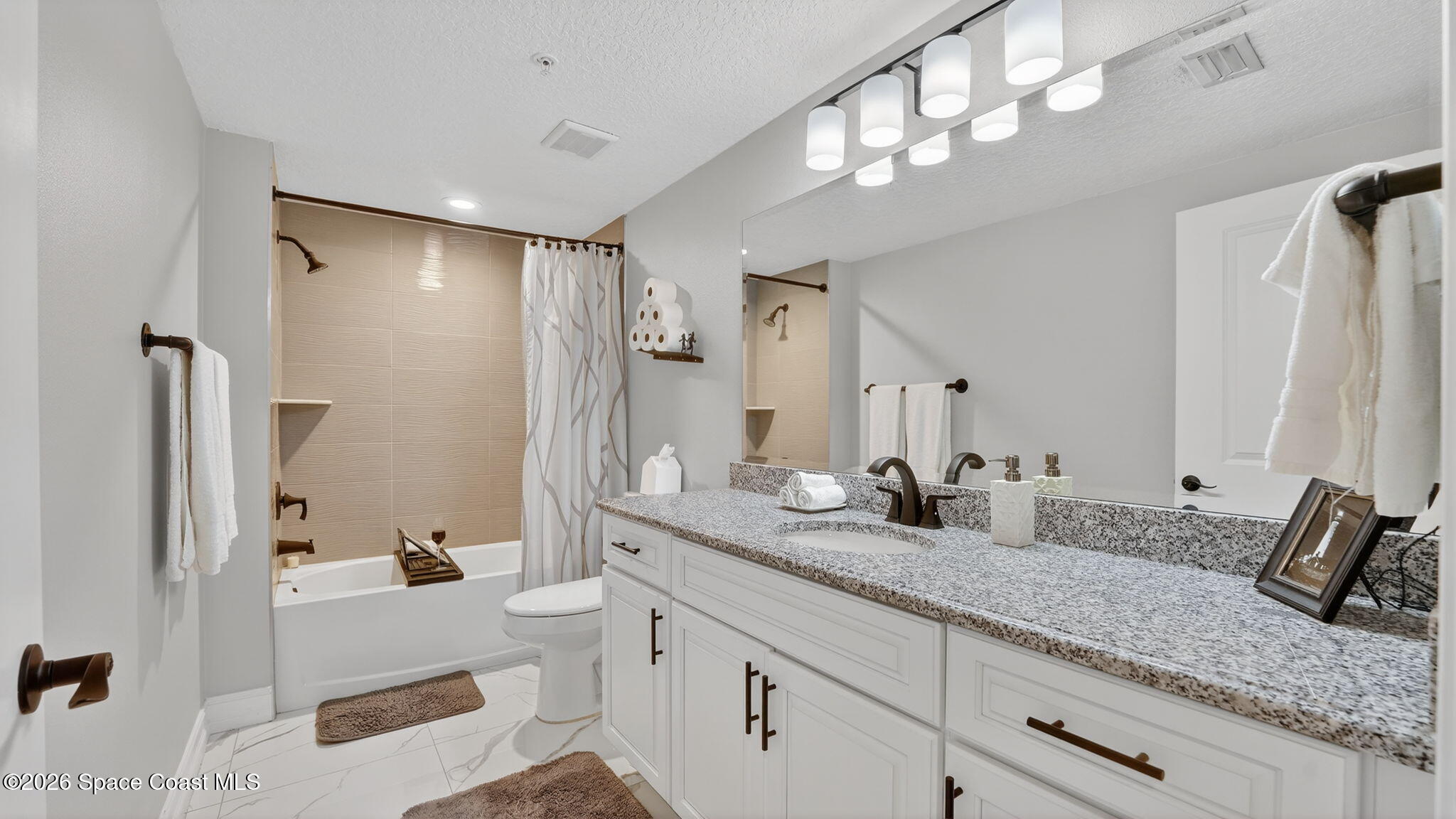 1805 Riverside Drive, Unit 302 Titusville, FL 32780 - Photo 31 of 49 Guest Bath