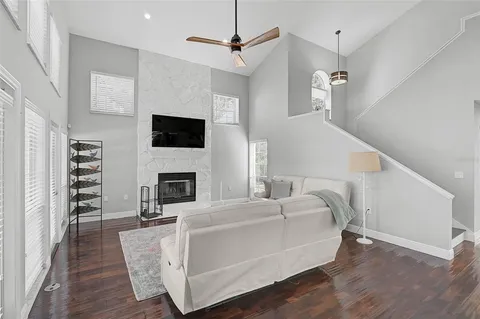 a living room with furniture and a rug