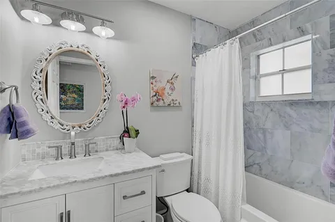 a view of swimming pool with seating space