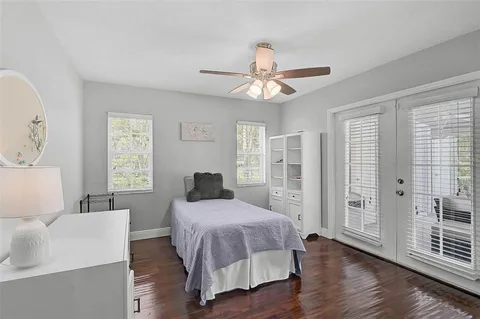 a view of a backyard with porch and patio