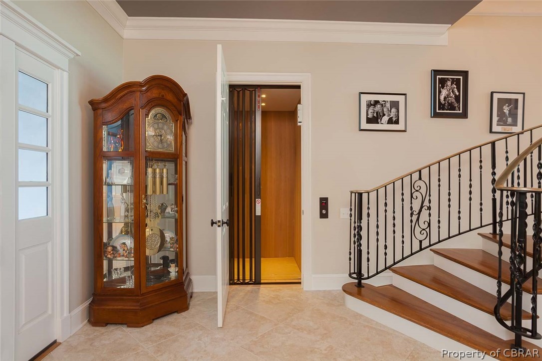 1901 Windmill Point Road White Stone, VA 22578 - Photo 28 of 47 Access the 2nd floor by the beautiful staircase or the elevator