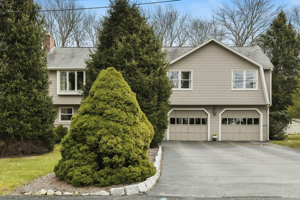 a view of a house with a garden