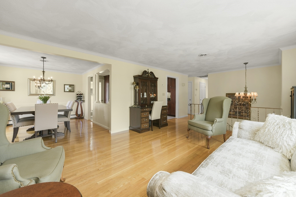 4 Coach Lane Dedham, MA 02026 - Photo 11 of 32 a living room with furniture and wooden floor