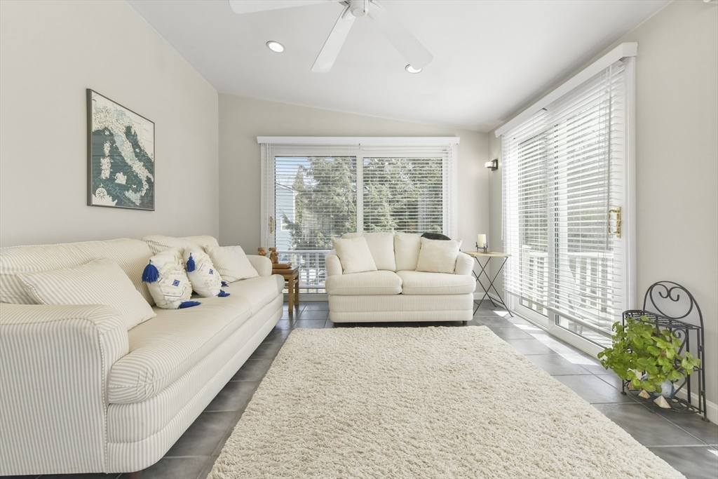 4 Coach Lane Dedham, MA 02026 - Photo 13 of 32 a living room with furniture and a large window