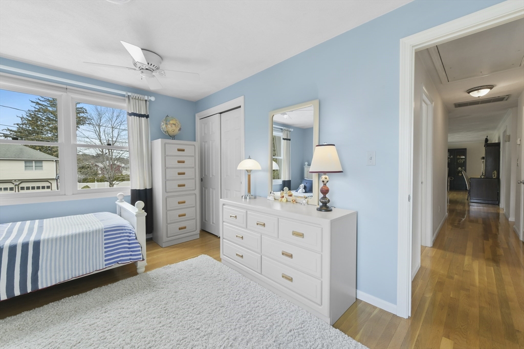 4 Coach Lane Dedham, MA 02026 - Photo 18 of 32 a bedroom with a bed and a view of bedroom