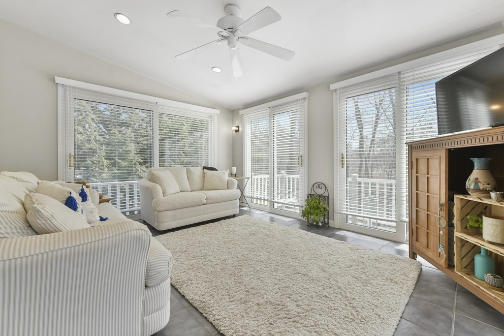 4 Coach Lane Dedham, MA 02026 - Photo 5 of 32 a living room with furniture and large windows