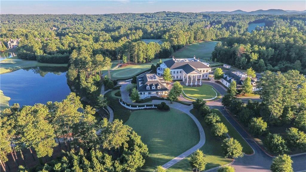 6218 Zell Miller Path Acworth, GA 30101 - Photo 29 of 53 an aerial view of a house with a garden and lake view