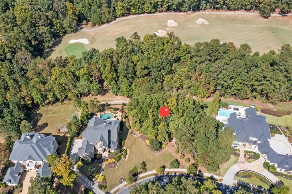 6218 Zell Miller Path Acworth, GA 30101 - Photo 3 of 53 an aerial view of a house with a yard and lake view