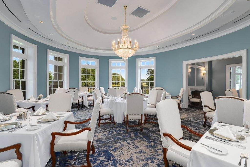 6218 Zell Miller Path Acworth, GA 30101 - Photo 34 of 53 a view of a dining room with furniture a chandelier and large windows