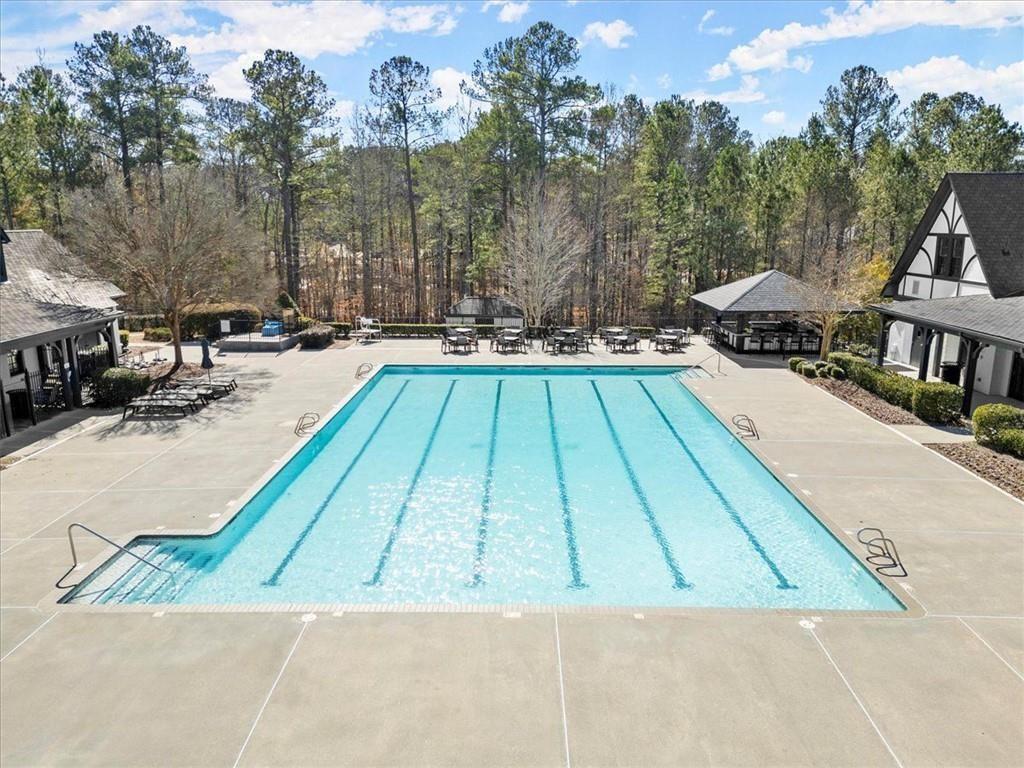 6218 Zell Miller Path Acworth, GA 30101 - Photo 42 of 53 a view of a swimming pool with a lounge chairs
