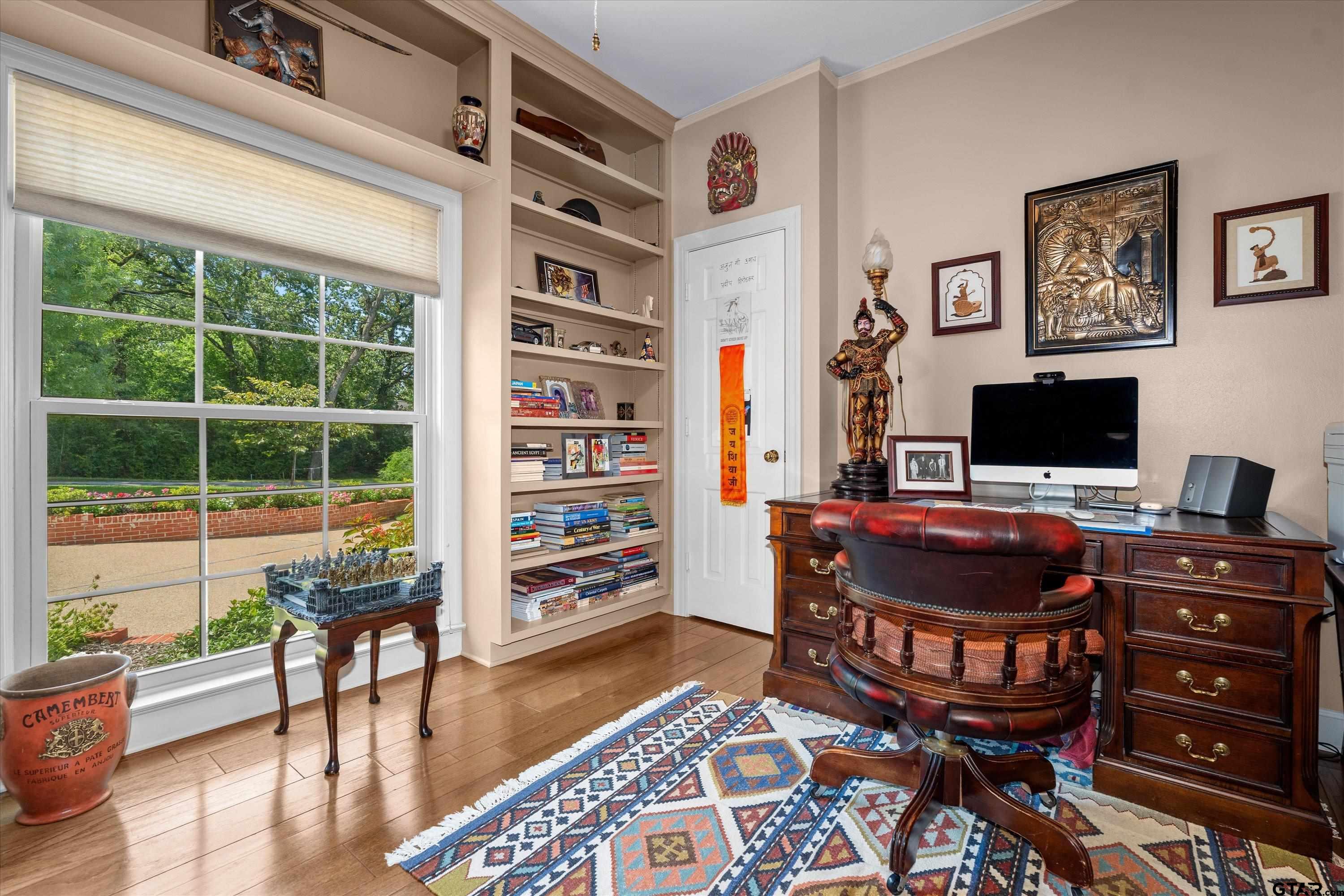 121 Fair Lane Tyler, TX 75701 - Photo 14 of 46 a living room with furniture and a flat screen tv