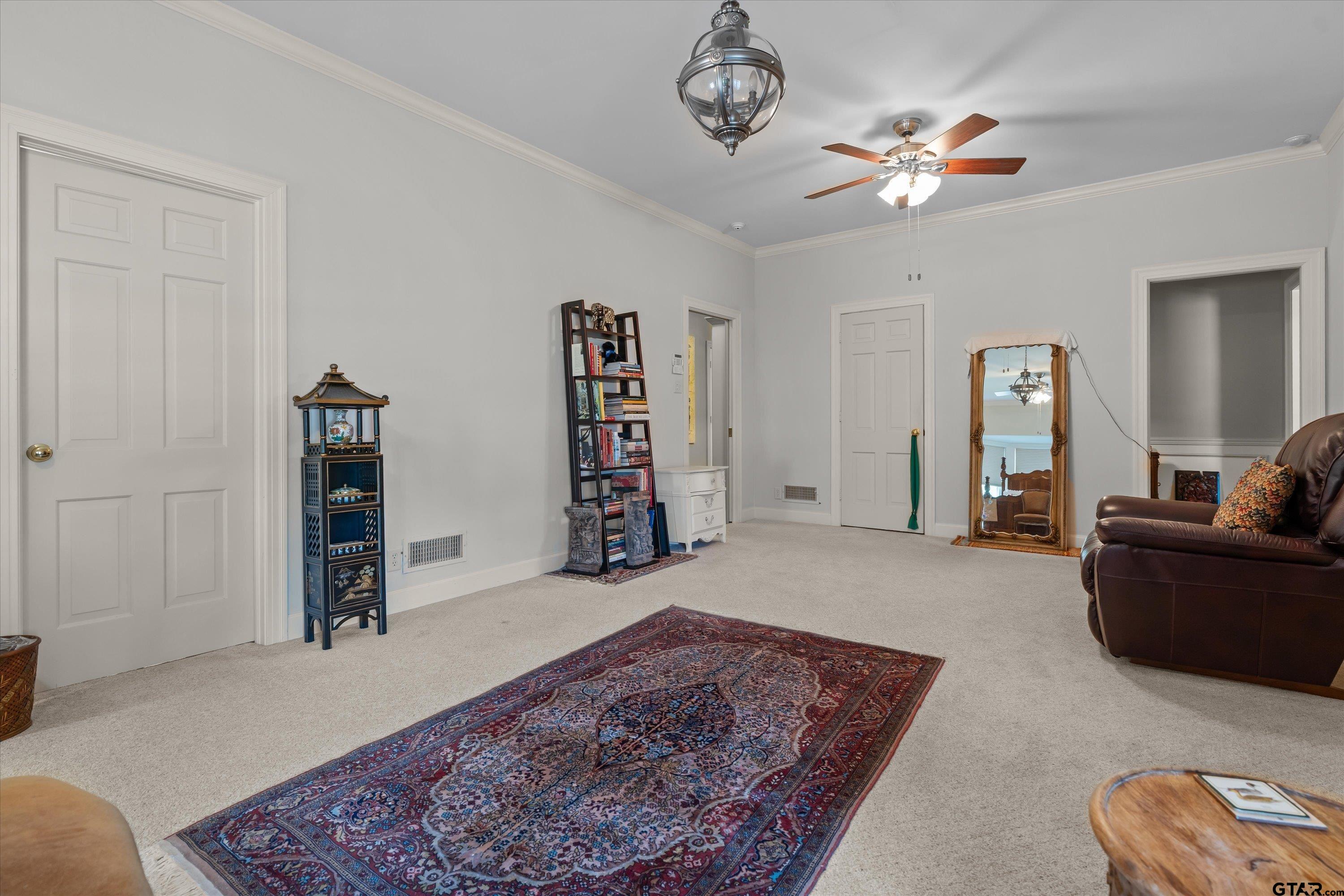 121 Fair Lane Tyler, TX 75701 - Photo 22 of 46 a living room with furniture and wooden floor