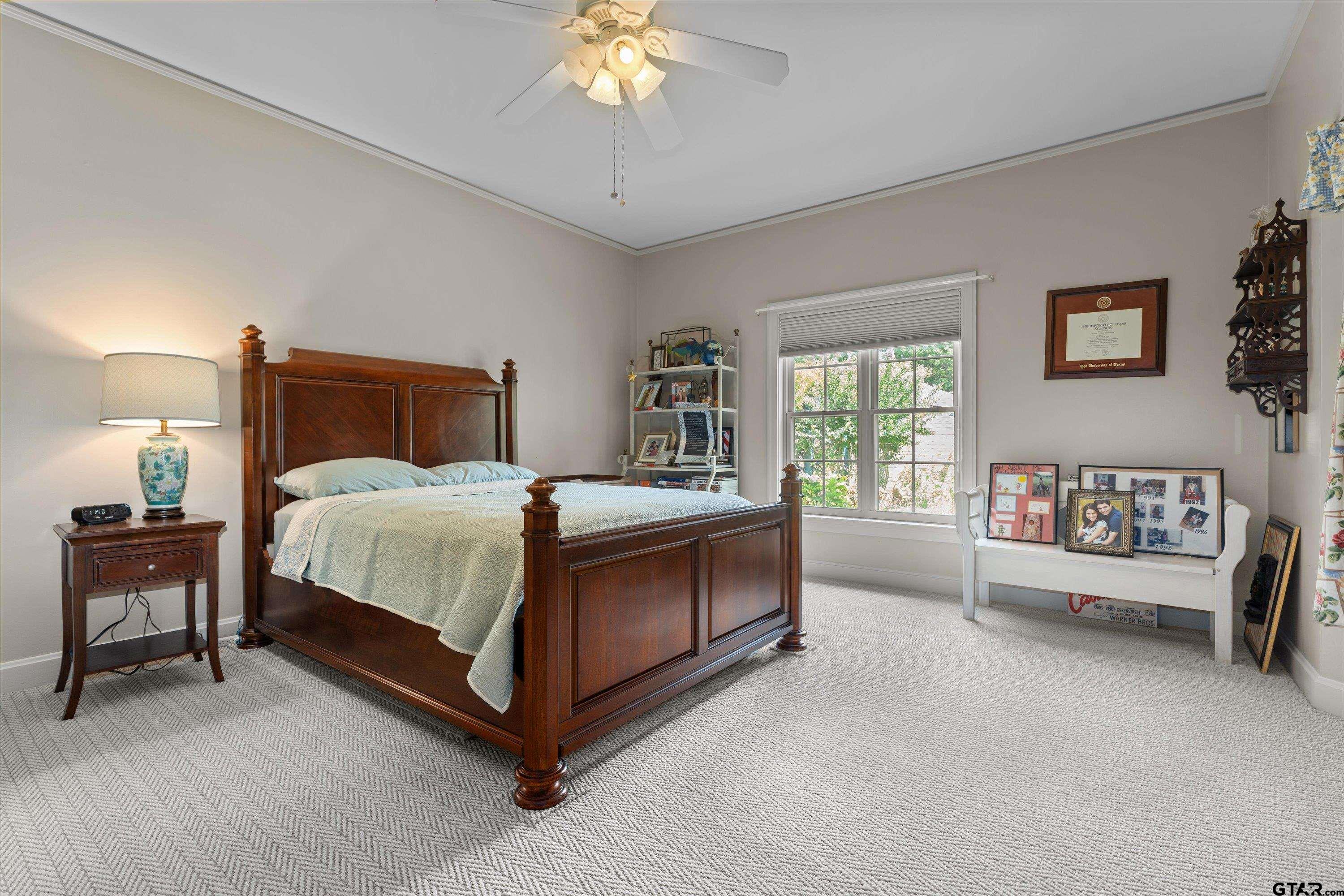 121 Fair Lane Tyler, TX 75701 - Photo 25 of 46 a bed room with a bed and a chair