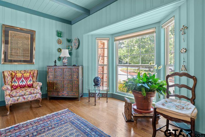 121 Fair Lane Tyler, TX 75701 - Photo 34 of 46 a living room with furniture and a potted plant