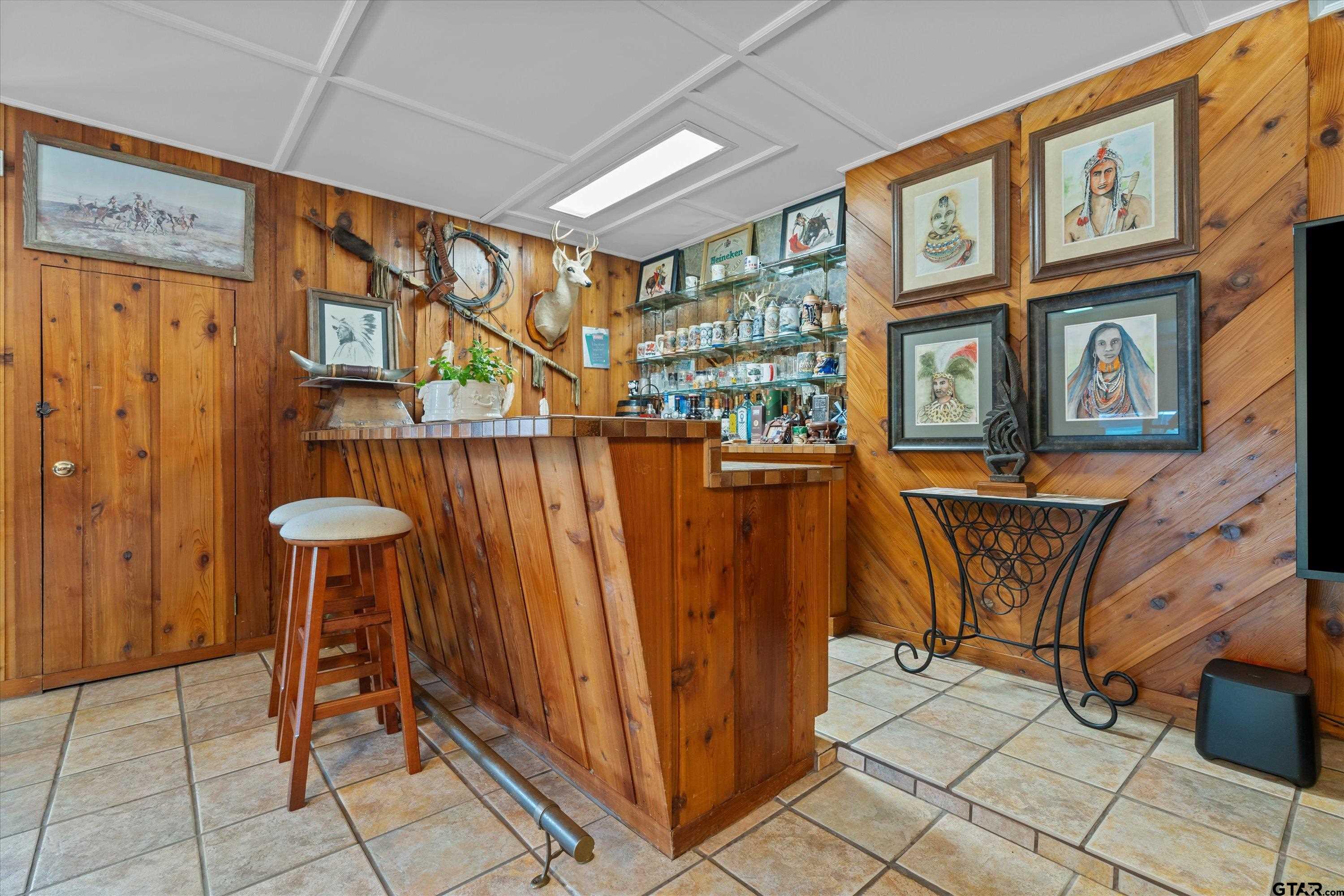 121 Fair Lane Tyler, TX 75701 - Photo 36 of 46 a view of a patio with table and chairs