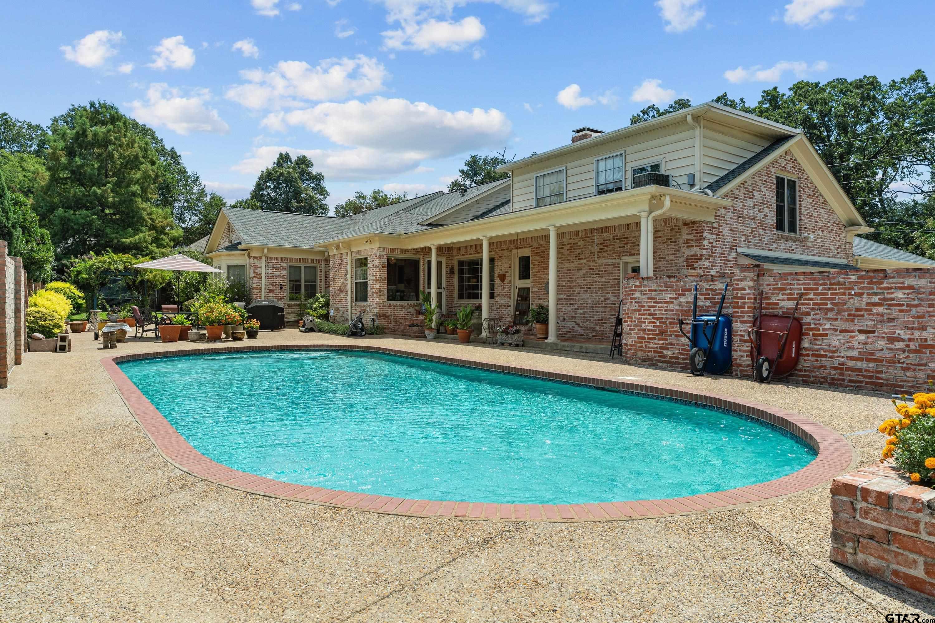 121 Fair Lane Tyler, TX 75701 - Photo 40 of 46 a view of a house with a backyard porch and sitting area