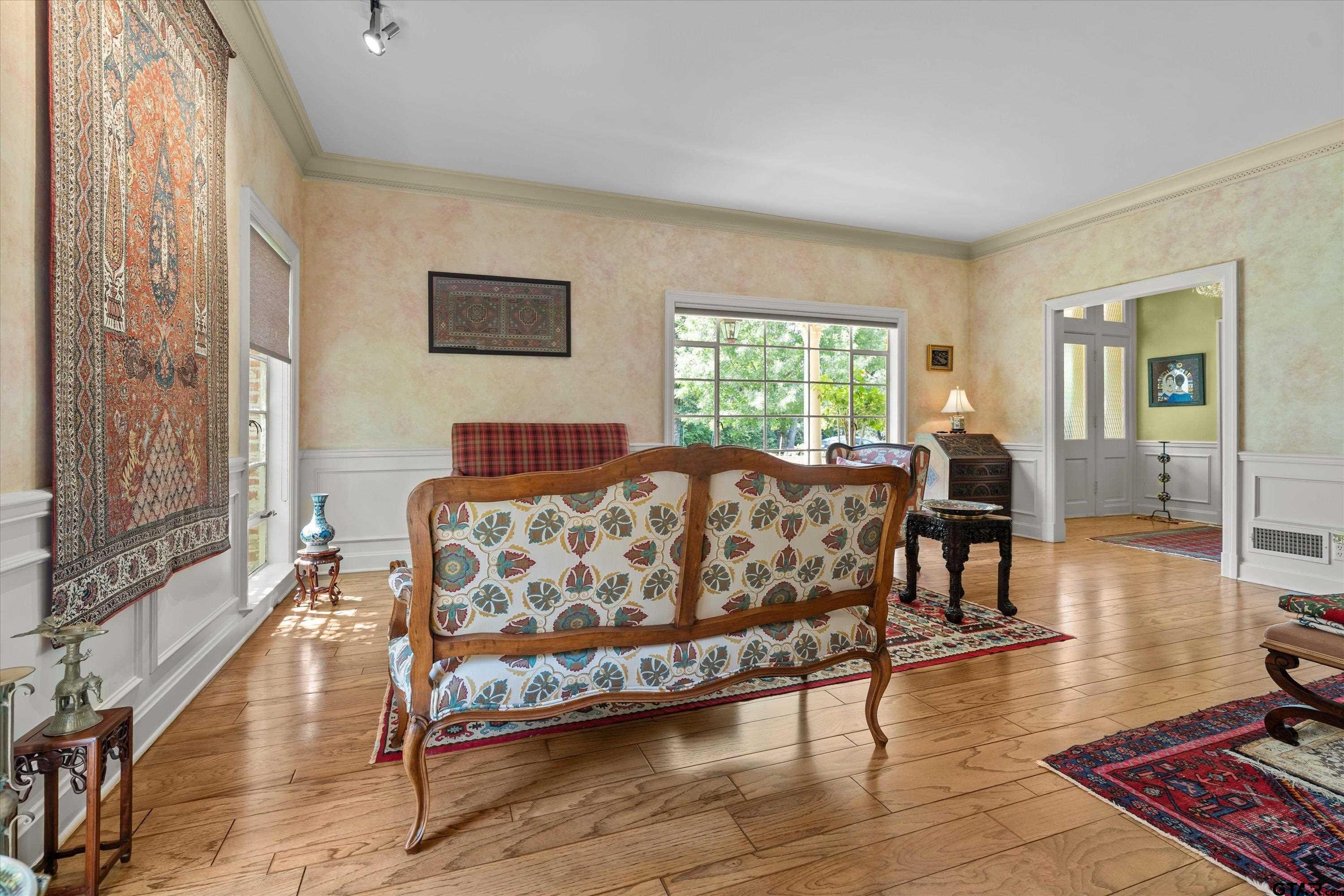 121 Fair Lane Tyler, TX 75701 - Photo 9 of 46 a living room with furniture and wooden floor