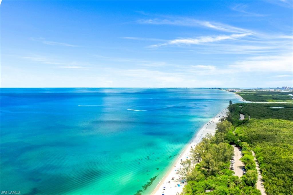 5 Bluebill Avenue, Unit 210 Naples, FL 34108 - Photo 23 of 26 a view of an ocean beach