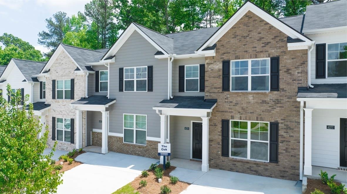2700 Paxton Place, Unit 10 Decatur, GA 30034 - Photo 1 of 1 a front view of a house with a yard