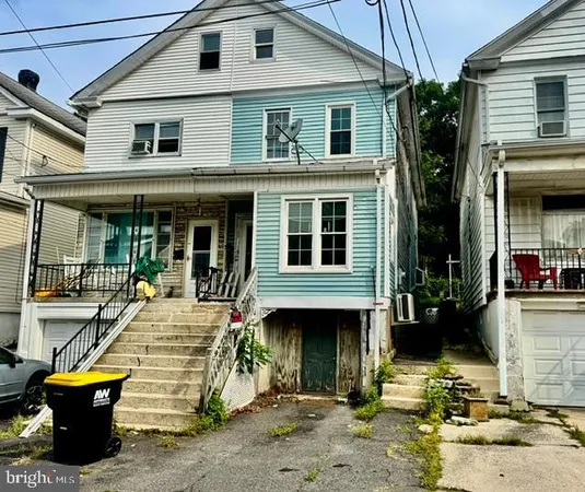 a front view of a house with patio