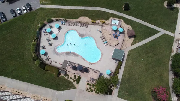 a view of a backyard with a lake view