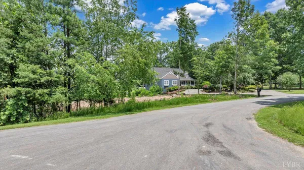 a view of a house with a street