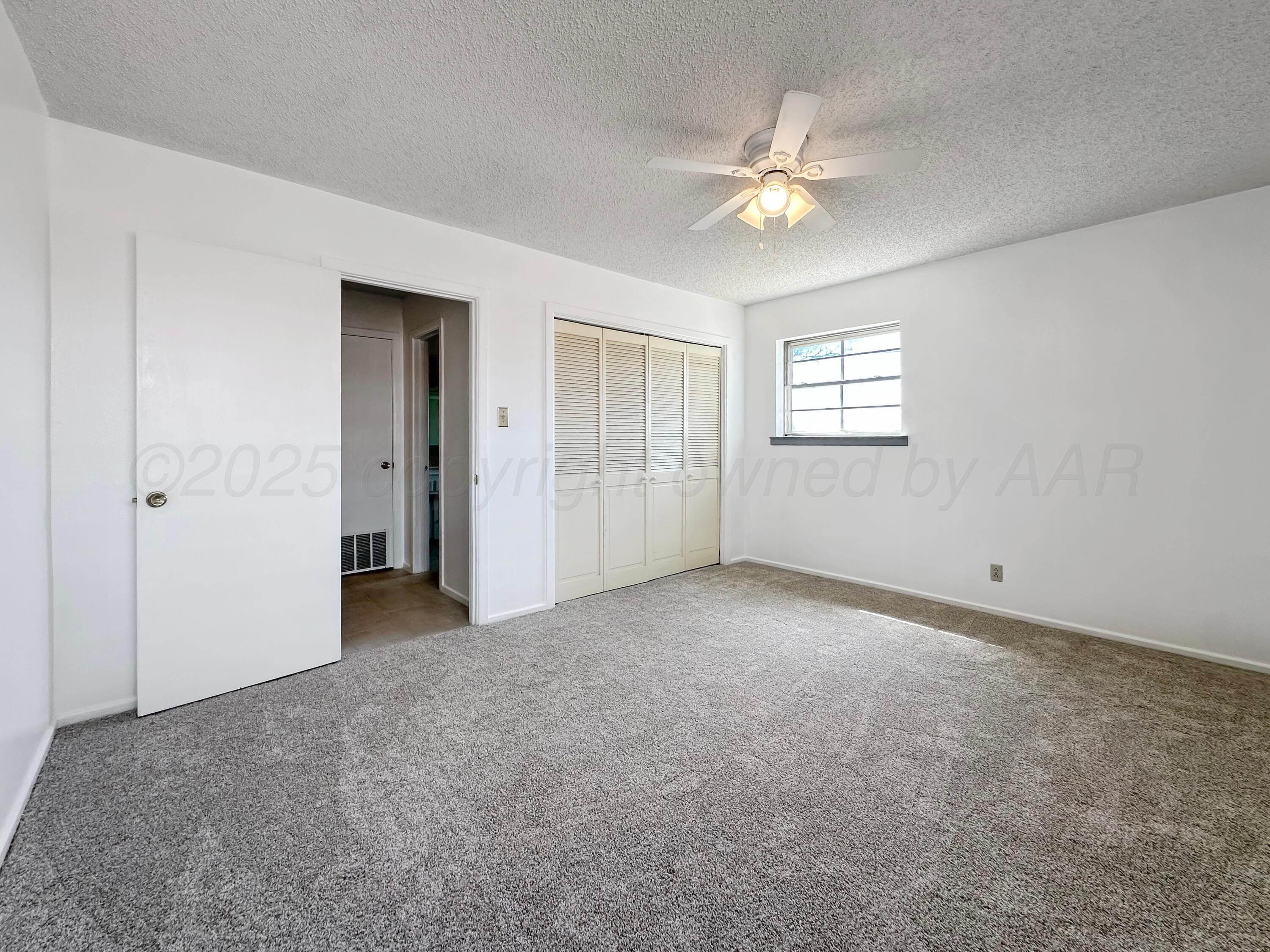 1421 Marigold Street Borger, TX 79007 - Photo 20 of 26 a view of an empty room with a window