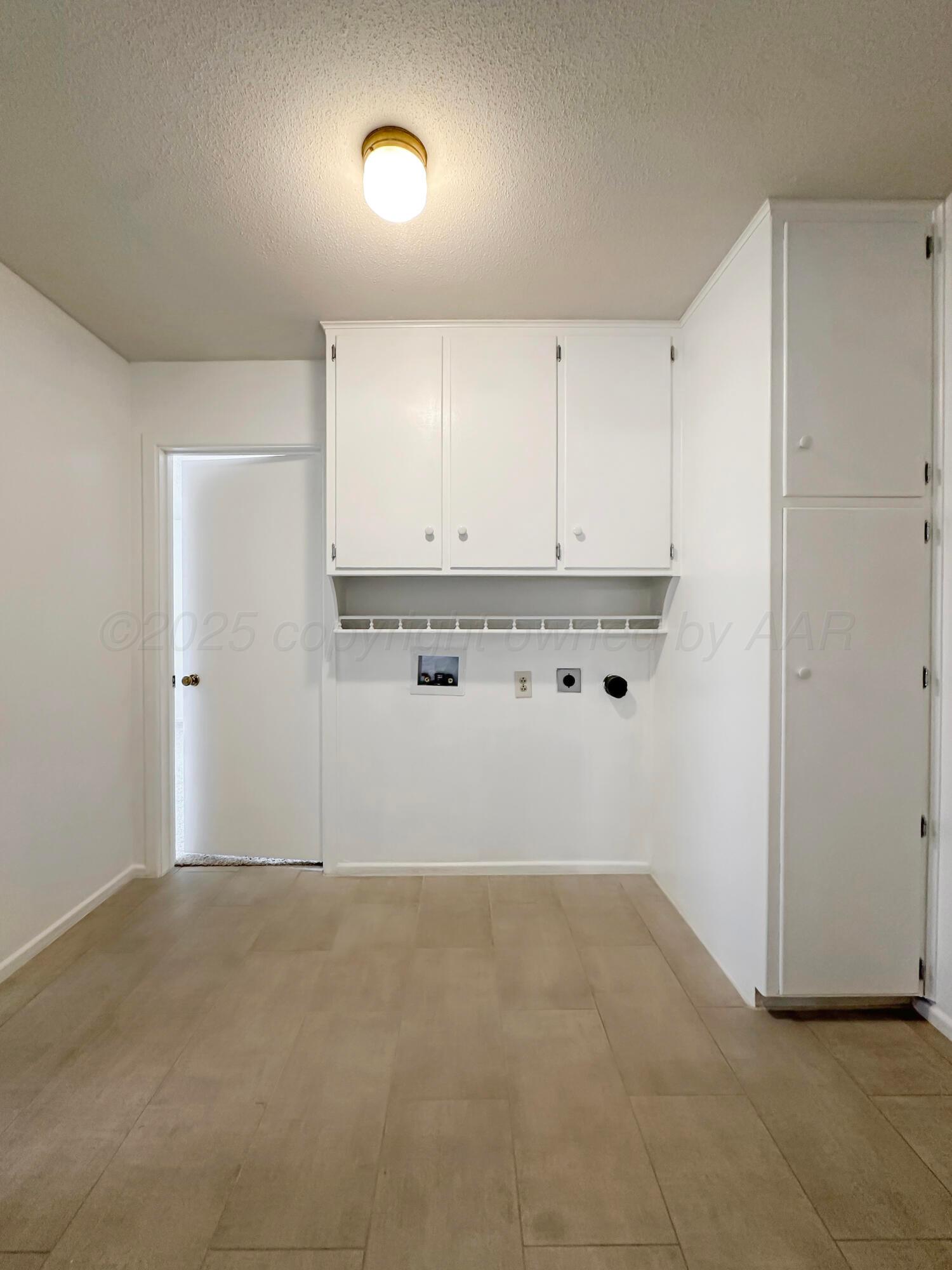 1421 Marigold Street Borger, TX 79007 - Photo 22 of 26 a view of cabinets