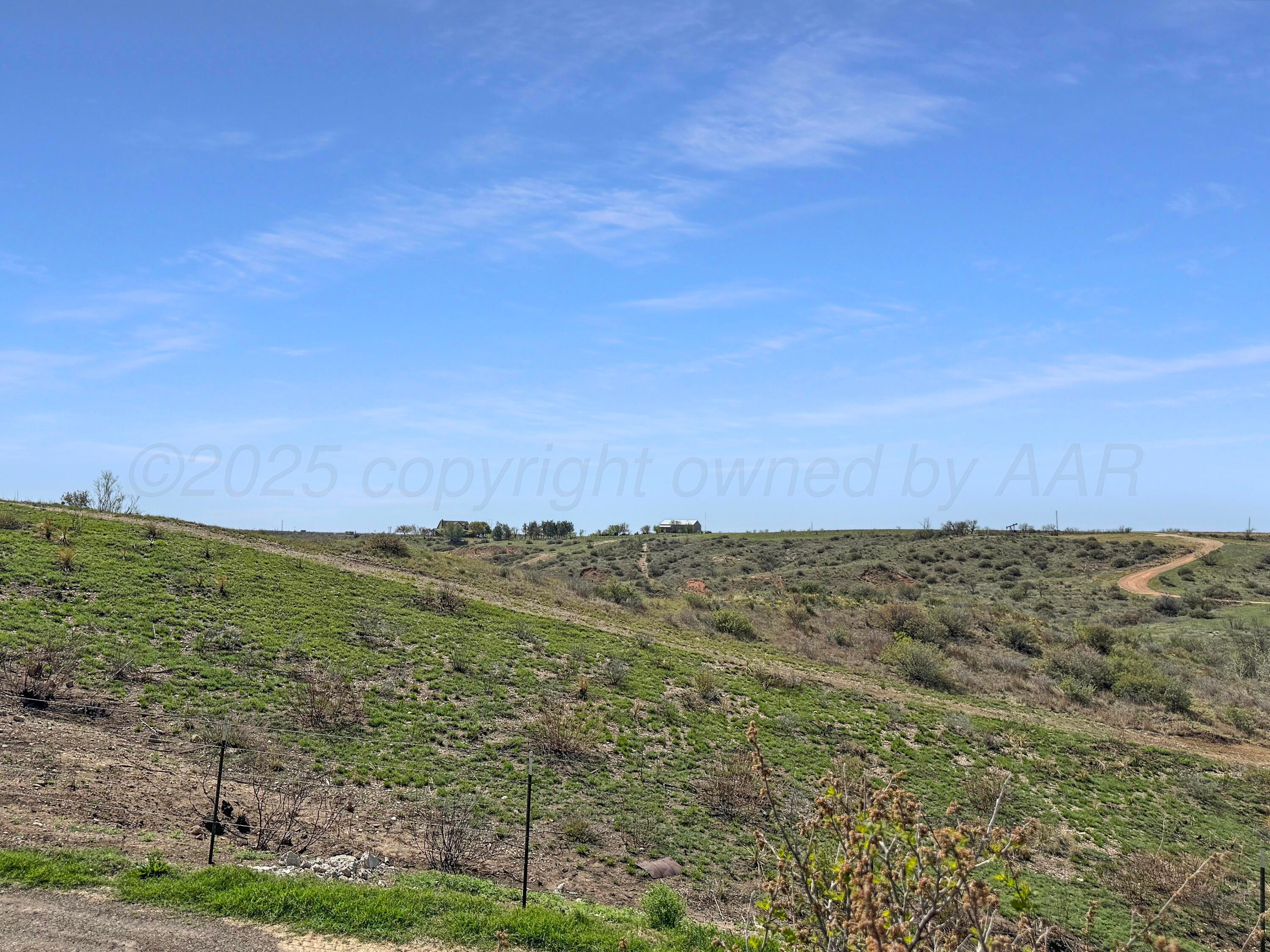 1421 Marigold Street Borger, TX 79007 - Photo 26 of 26 a view of a field with an ocean