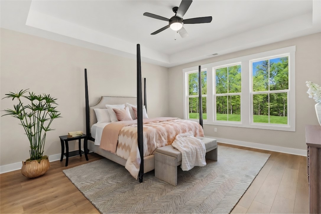 334 Summerall Drive Anderson, SC 29621 - Photo 26 of 28 This spacious bedroom offers serene views and an inviting atmosphere.