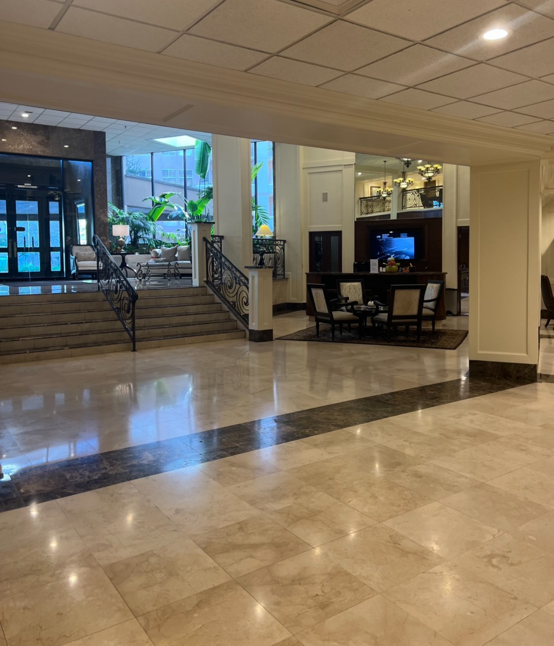 3525 Sage Road, Unit 1708 Houston, TX 77056 - Photo 13 of 14 a view of a living room with kitchen countertops and a flat screen tv