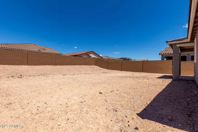 a view of a house with a snow in the yard