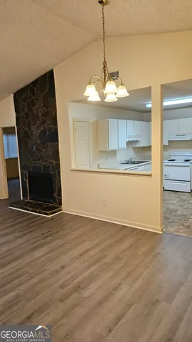 a view of a livingroom with a fireplace