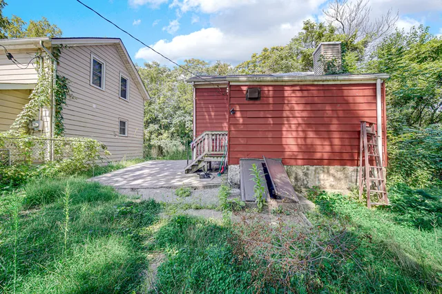a backyard of a house with lots of green space