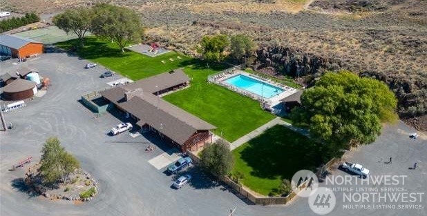 565 Snaffle Court Ephrata, WA 98823 - Photo 37 of 40 an aerial view of a house with a yard and lake view