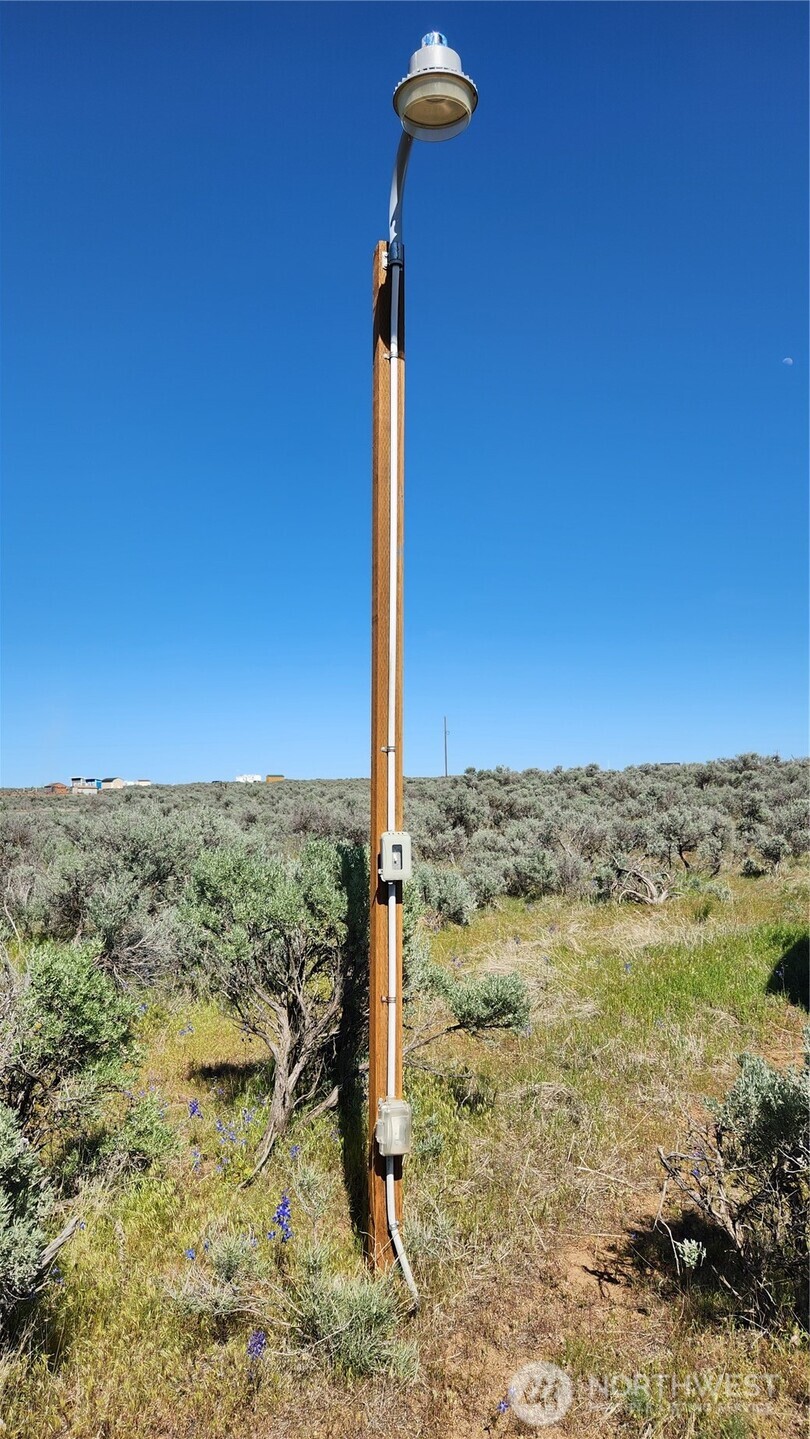 565 Snaffle Court Ephrata, WA 98823 - Photo 6 of 40 a view of a road with an ocean view