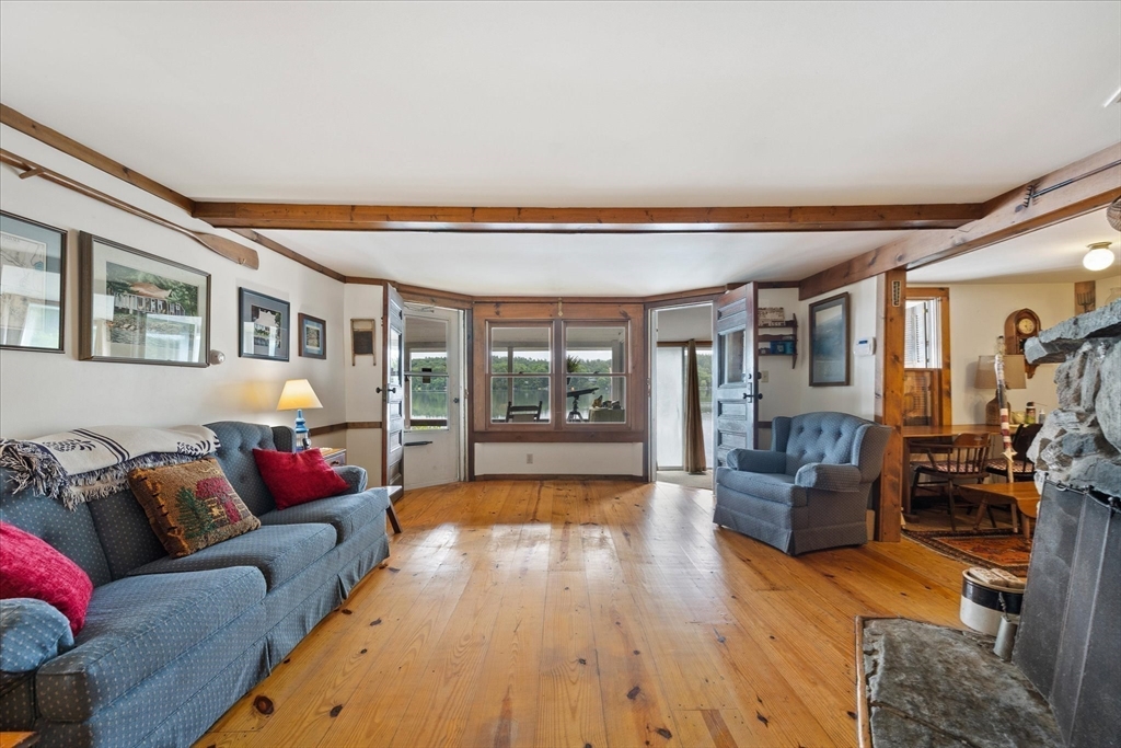 35 Mt Dan Road Sturbridge, MA 01518 - Photo 11 of 37 a living room with furniture and wooden floor