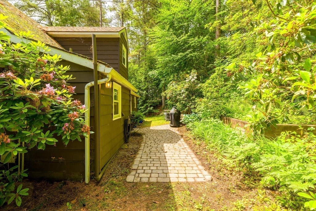 35 Mt Dan Road Sturbridge, MA 01518 - Photo 28 of 37 a view of a pathway of a house with yard